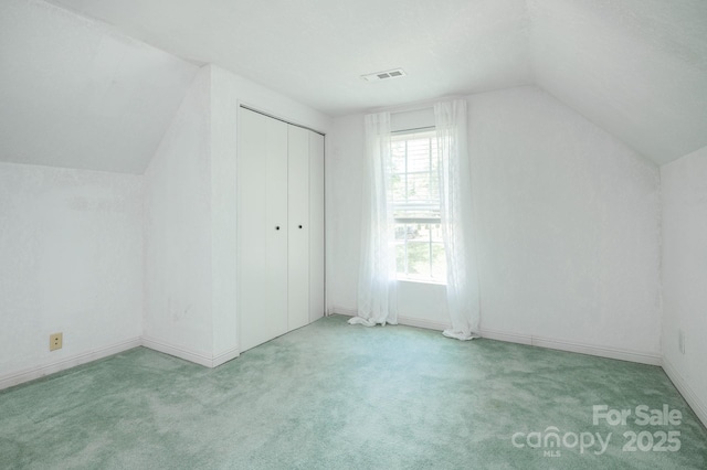 19 Lynnbrook Way, Columbus, NC 28722 - bonus room featuring lofted ceiling, carpet floors, healthy amount of natural light, and baseboards