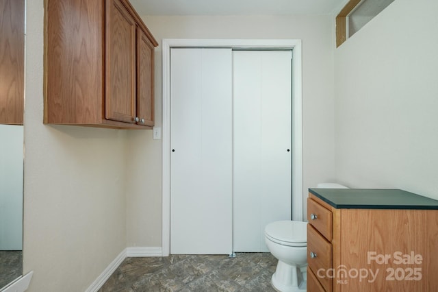 19 Lynnbrook Way, Columbus, NC 28722 - bathroom featuring toilet and baseboards
