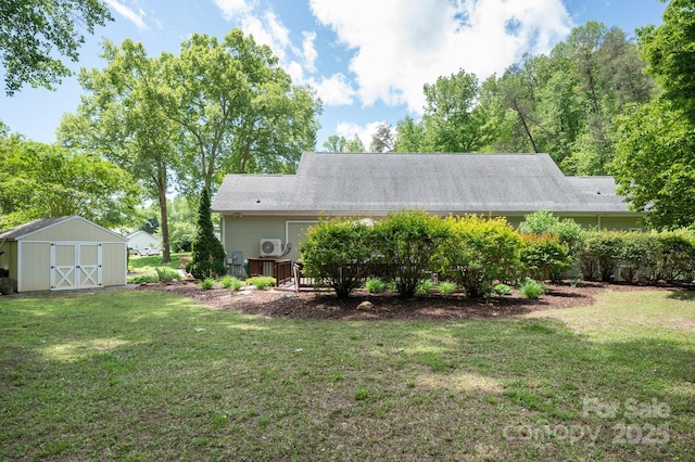 19 Lynnbrook Way, Columbus, NC 28722 - back of property featuring a shed, an outbuilding, a yard, and a deck