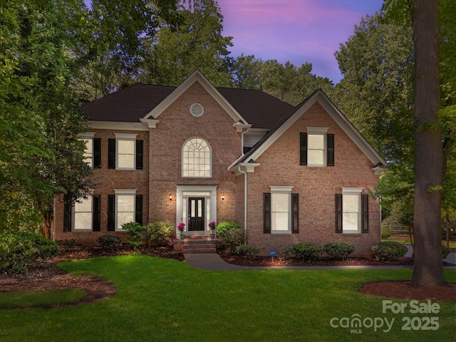 15831 Breton Brook St, Huntersville, NC 28078 - view of front facade featuring a front yard and brick siding