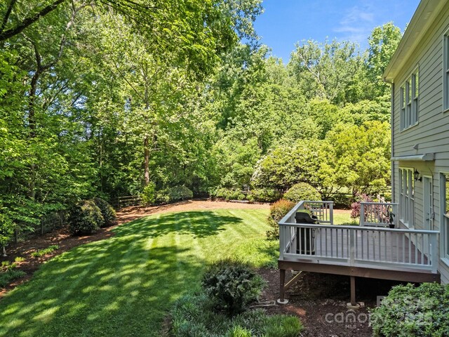 15831 Breton Brook St, Huntersville, NC 28078 - view of grassy yard with a wooden deck and a forest view