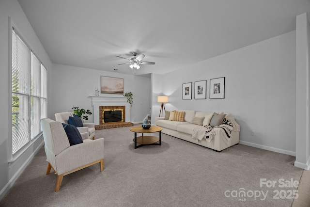 15831 Breton Brook St, Huntersville, NC 28078 - living room featuring a ceiling fan, carpet flooring, baseboards, and a fireplace
