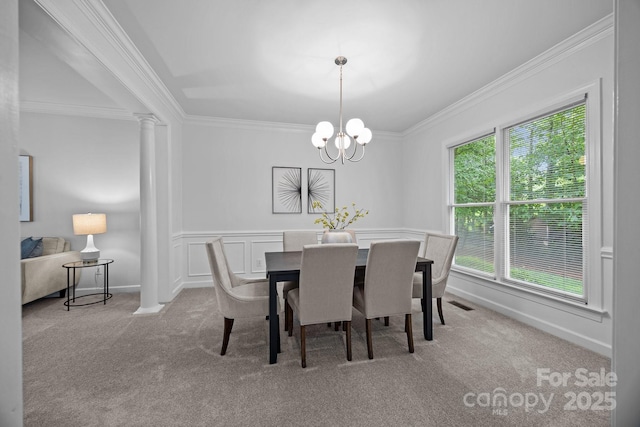 15831 Breton Brook St, Huntersville, NC 28078 - carpeted dining room featuring crown molding, a chandelier, and ornate columns