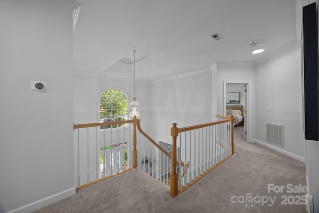 15831 Breton Brook St, Huntersville, NC 28078 - hallway with carpet floors, an upstairs landing, crown molding, and baseboards