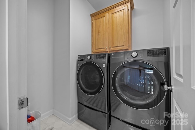 15831 Breton Brook St, Huntersville, NC 28078 - clothes washing area with cabinet space, washer and dryer, and baseboards