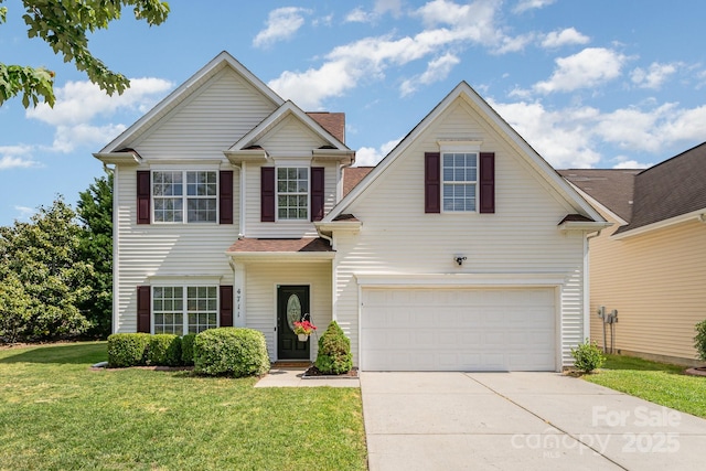 traditional-style house with driveway, a front lawn, and an attached garage