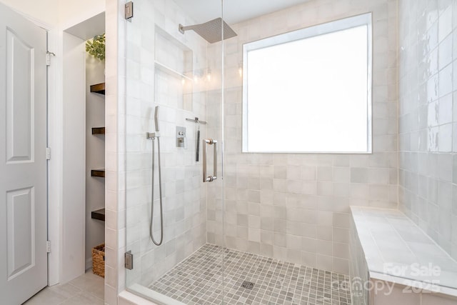 full bath featuring a stall shower