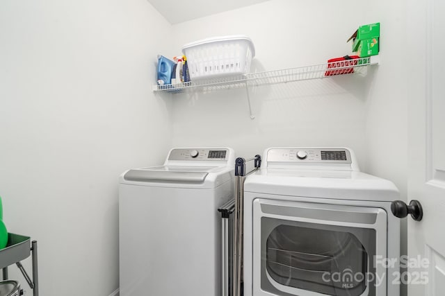 washroom featuring separate washer and dryer