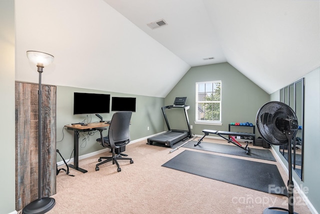 workout area with carpet, lofted ceiling, and baseboards
