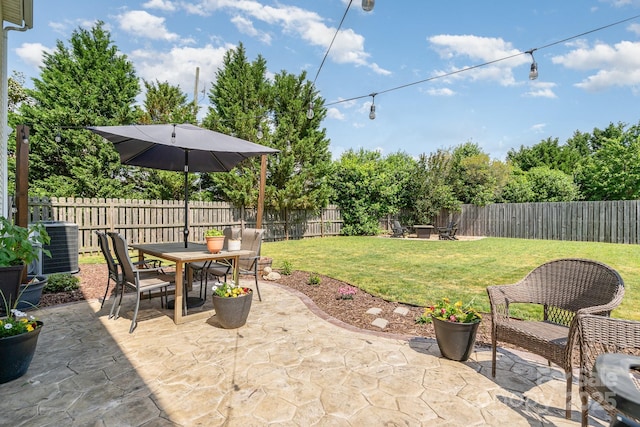 view of patio / terrace featuring central air condition unit and outdoor dining area