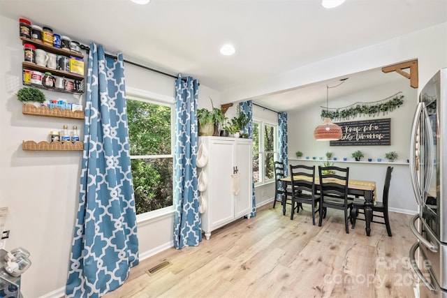 27037 Tidal Way, Tega Cay, SC 29708 - dining area with wood finished floors, recessed lighting, and baseboards