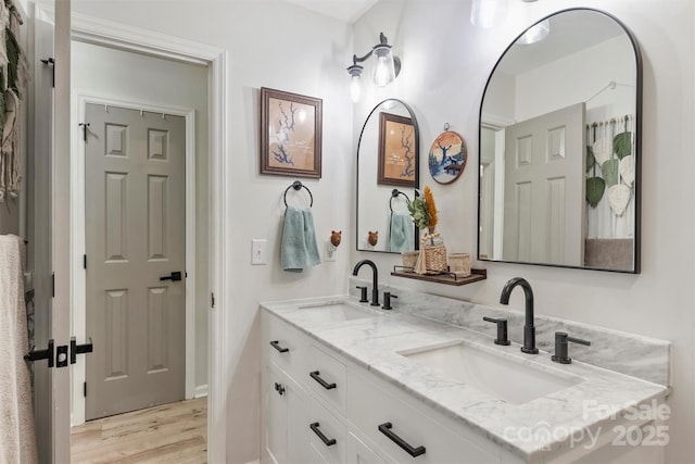 27037 Tidal Way, Tega Cay, SC 29708 - full bath featuring double vanity and wood finished floors