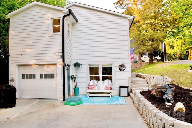 27037 Tidal Way, Tega Cay, SC 29708 - back of house with an attached garage and driveway