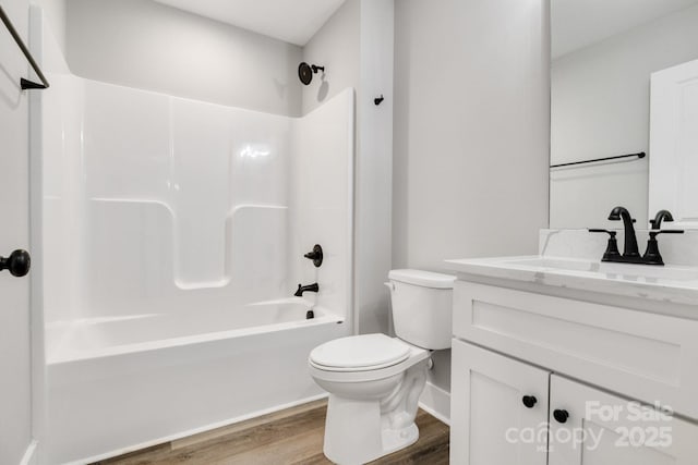 1222 Summerhill St SW, Lenoir, NC 28645 - bathroom with wood finished floors, vanity, and shower / bathtub combination