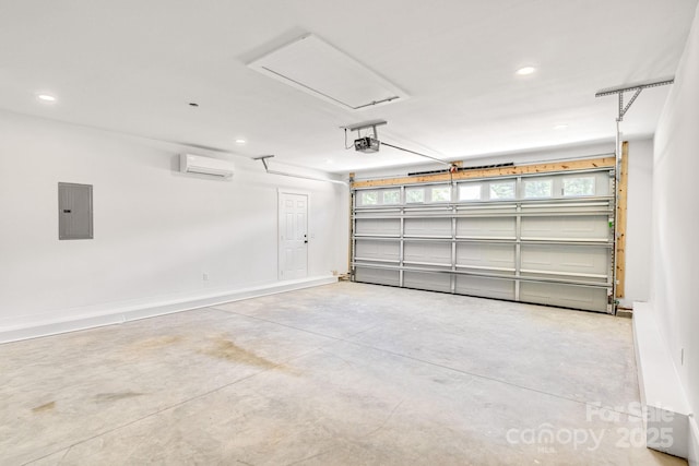 1222 Summerhill St SW, Lenoir, NC 28645 - garage with electric panel, a wall unit AC, a garage door opener, and recessed lighting