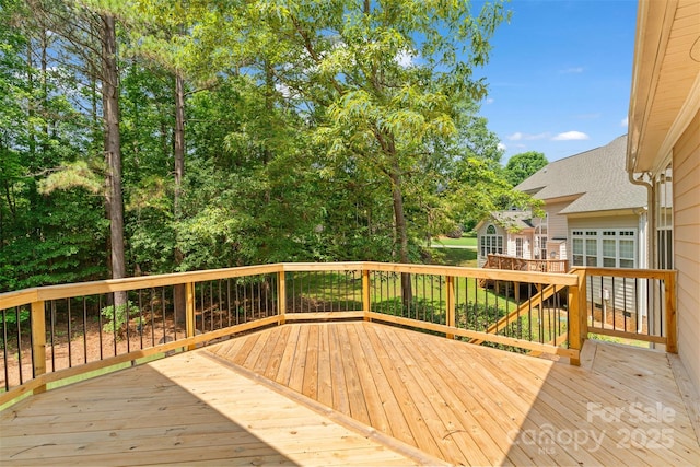104 Whiterock Dr, Mount Holly, NC 28120 - wooden deck featuring view of wooded area