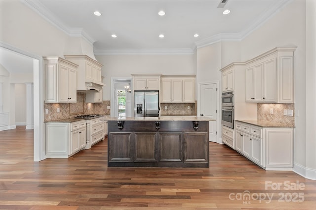 104 Whiterock Dr, Mount Holly, NC 28120 - kitchen featuring stainless steel appliances, light stone counters, crown molding, dark wood-style floors, and tasteful backsplash