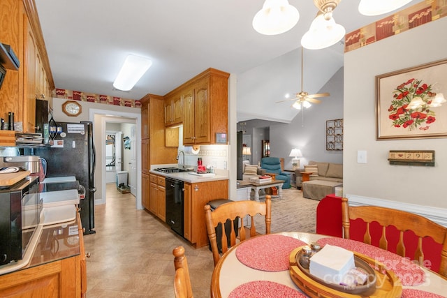 dining room featuring ceiling fan and vaulted ceiling