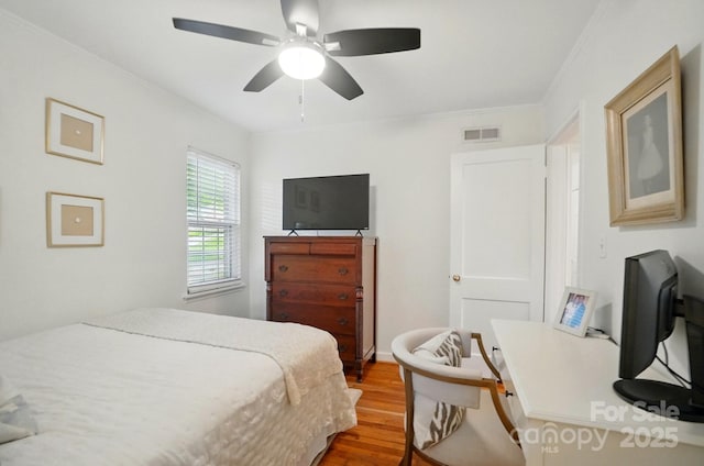 4647 General Pershing Dr, Charlotte, NC 28209 - bedroom with wood finished floors, ceiling fan, and a desk