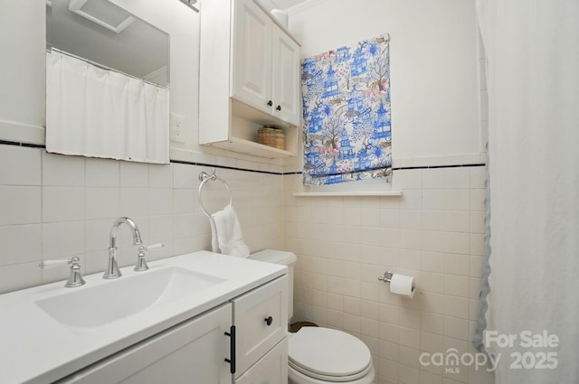 4647 General Pershing Dr, Charlotte, NC 28209 - full bathroom featuring tile walls, toilet, and vanity