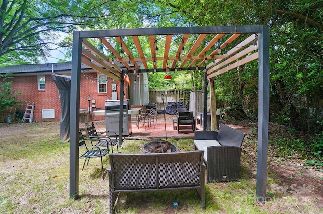 4647 General Pershing Dr, Charlotte, NC 28209 - view of patio / terrace featuring an outdoor fire pit, a pergola, grilling area, and fence