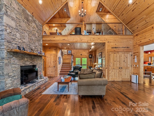 917 Otter Mountain Rd, Topton, NC 28781 - living area featuring high vaulted ceiling, hardwood / wood-style floors, wooden ceiling, wood walls, and stairs