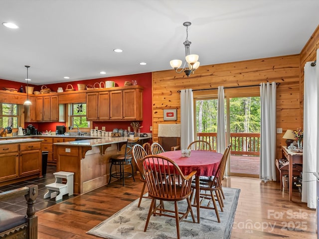 917 Otter Mountain Rd, Topton, NC 28781 - dining space with light wood-type flooring, recessed lighting, wood walls, and a chandelier