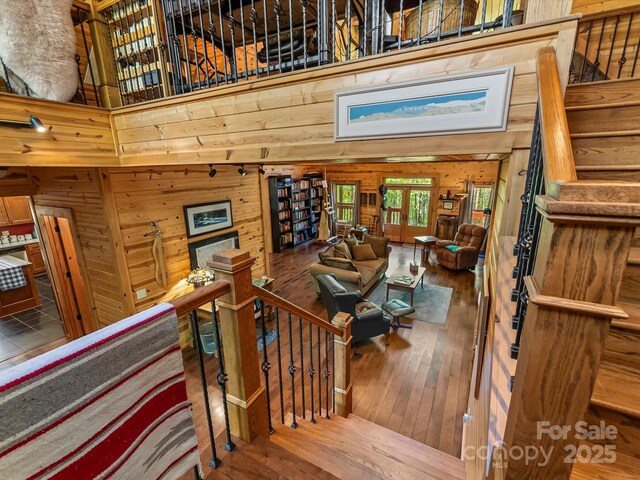 917 Otter Mountain Rd, Topton, NC 28781 - staircase with wood walls and wood-type flooring