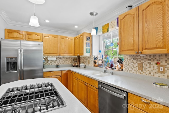 50 Pinerose Dr, Weaverville, NC 28787 - kitchen featuring appliances with stainless steel finishes, a sink, pendant lighting, ornamental molding, and light countertops