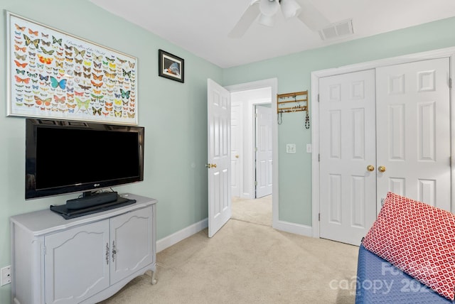 50 Pinerose Dr, Weaverville, NC 28787 - bedroom with light carpet, a closet, baseboards, and a ceiling fan