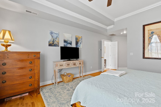 50 Pinerose Dr, Weaverville, NC 28787 - bedroom featuring crown molding, light wood-style floors, a ceiling fan, and baseboards
