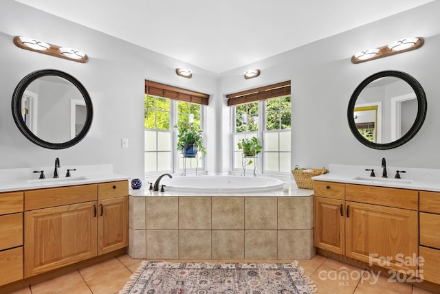 50 Pinerose Dr, Weaverville, NC 28787 - full bathroom featuring tile patterned flooring, two vanities, and a bath