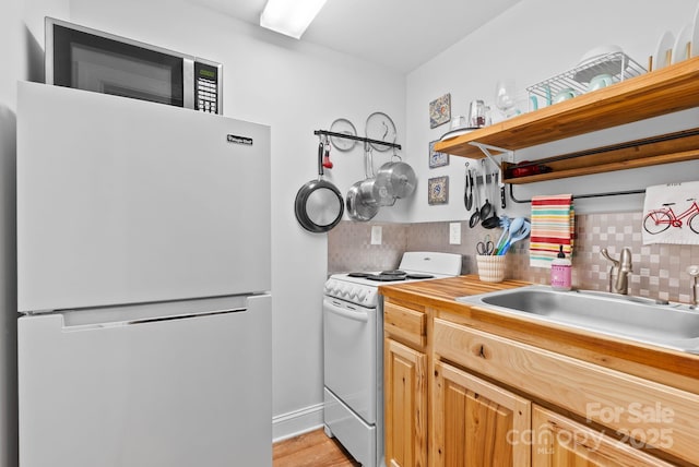 50 Pinerose Dr, Weaverville, NC 28787 - kitchen featuring white appliances, a sink, open shelves, decorative backsplash, and light wood-style floors