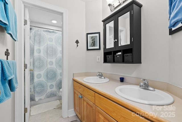 50 Pinerose Dr, Weaverville, NC 28787 - bathroom with double vanity, tile patterned flooring, toilet, and a shower with shower curtain