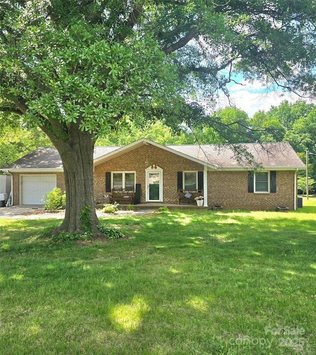 6573 Weldon Cir NW Unit 22, Concord, NC 28027 - ranch-style home featuring brick siding, a front yard, and a garage