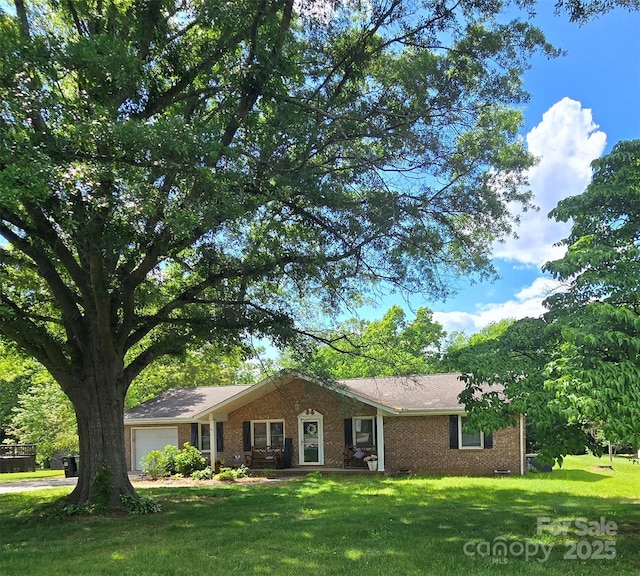 6573 Weldon Cir NW Unit 22, Concord, NC 28027 - ranch-style house with brick siding, a garage, and a front yard