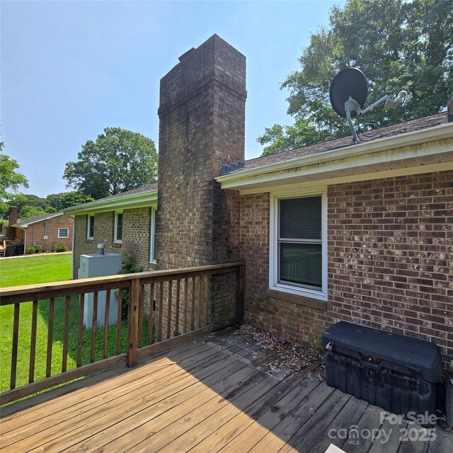6573 Weldon Cir NW Unit 22, Concord, NC 28027 - deck with a yard