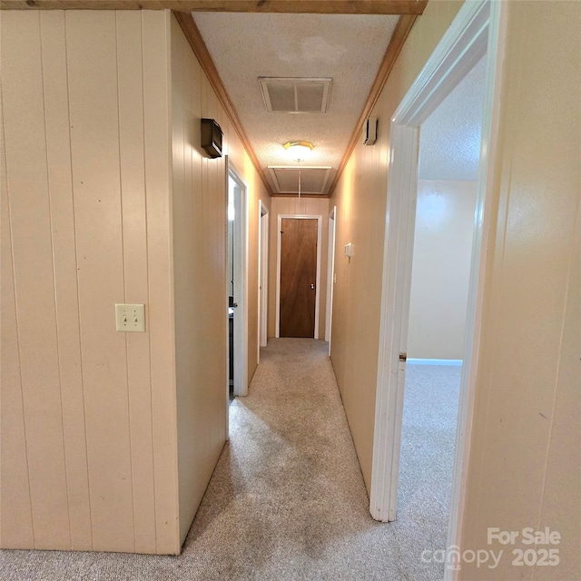 6573 Weldon Cir NW Unit 22, Concord, NC 28027 - corridor with attic access, ornamental molding, and light colored carpet