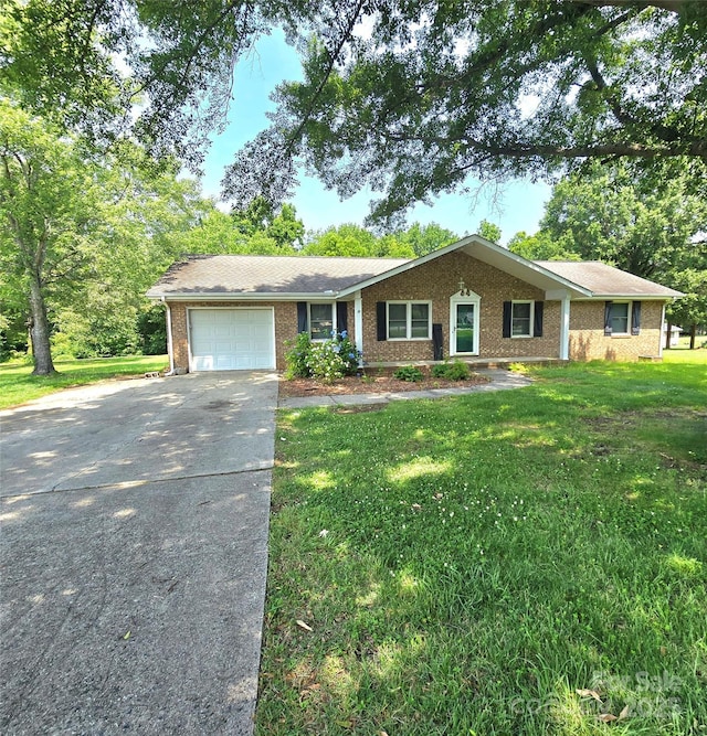 6573 Weldon Cir NW Unit 22, Concord, NC 28027 - single story home with an attached garage, brick siding, driveway, and a front lawn