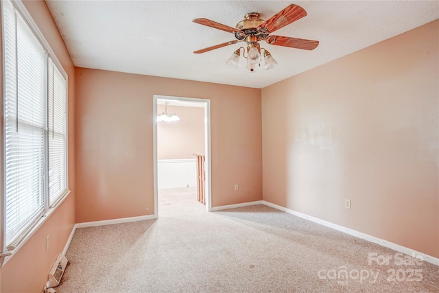 6573 Weldon Cir NW Unit 22, Concord, NC 28027 - carpeted spare room featuring a ceiling fan and baseboards
