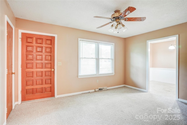 6573 Weldon Cir NW Unit 22, Concord, NC 28027 - entryway featuring a ceiling fan and carpet floors