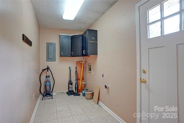 6573 Weldon Cir NW Unit 22, Concord, NC 28027 - laundry area with washer hookup, cabinet space, electric panel, a textured ceiling, and light tile patterned floors