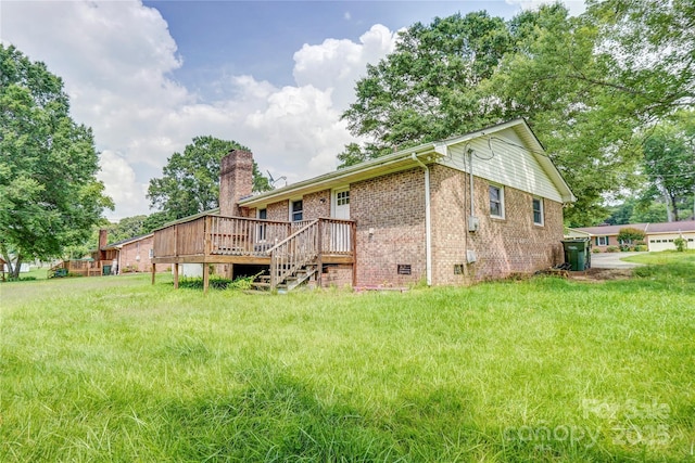 6573 Weldon Cir NW Unit 22, Concord, NC 28027 - back of property featuring a wooden deck, brick siding, a chimney, and crawl space