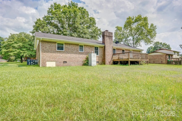 6573 Weldon Cir NW Unit 22, Concord, NC 28027 - back of house featuring crawl space, a chimney, a deck, and brick siding