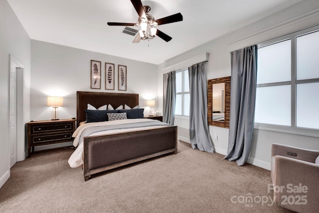 bedroom with carpet floors, baseboards, and ceiling fan