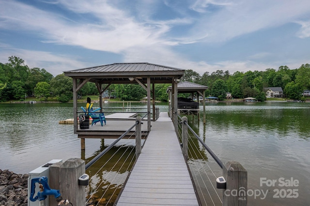 dock with a water view and boat lift