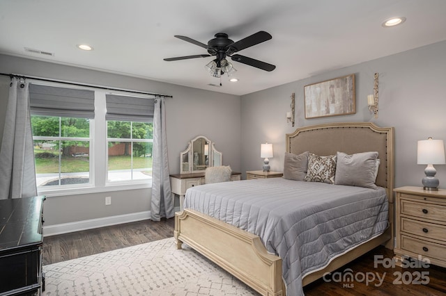bedroom with wood finished floors, recessed lighting, baseboards, and ceiling fan