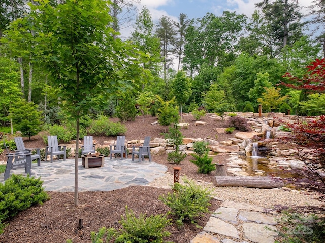 276 Stone Field Trl, Brevard, NC 28712 - view of patio featuring a fire pit