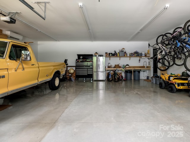 276 Stone Field Trl, Brevard, NC 28712 - garage featuring a garage door opener and freestanding refrigerator