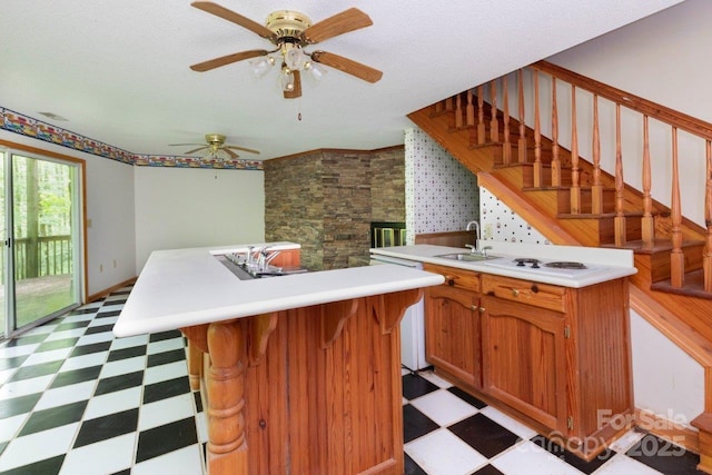 307 Five Star Dr, Glenville, NC 28736 - kitchen featuring light floors, a sink, a kitchen island, and light countertops